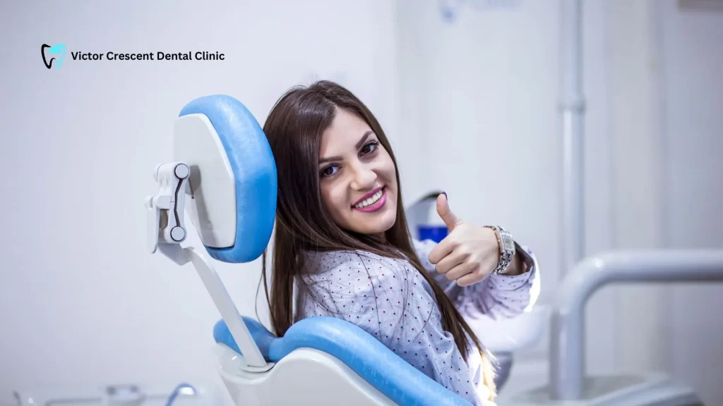 Patient giving thumbs up in the chair at Dental Clinic in Narre Warren after a successful, comfortable check-up