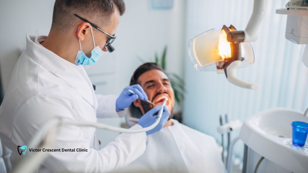 Dentist providing urgent care to a patient at the Emergency Dental Clinic Pakenham
